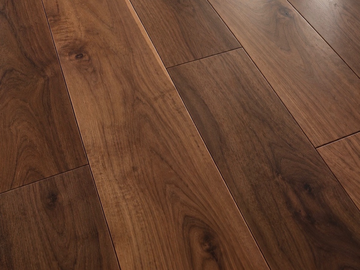Rich dark walnut hardwood planks with flowing grain